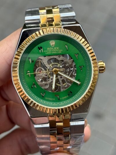 ROLex LAND DWELLER SKELETON COMES WITH DUAL TONE STRAP AND GREEN DIAL